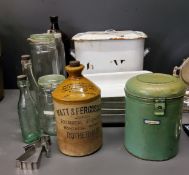 Kitchenalia - an enamelled bread bin;  four enamelled dishes;  glass storage jars;  a stoneware Watt