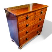 A 19th century mahogany chest, of two short above three long graduated drawers, turned feet, 108cm