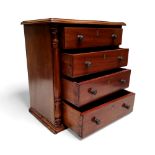 Miniature Furniture - a  19th century apprentice chest, of four long graduated drawers, flanked by