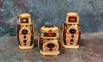 A Royal Crown Derby Imari 1128 pattern three piece cruet set, comprising salt, pepper and mustard