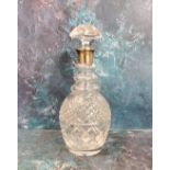 A silver mounted and cut glass decanter, triple ring neck, mushroom stopper, 31cm high, Israel