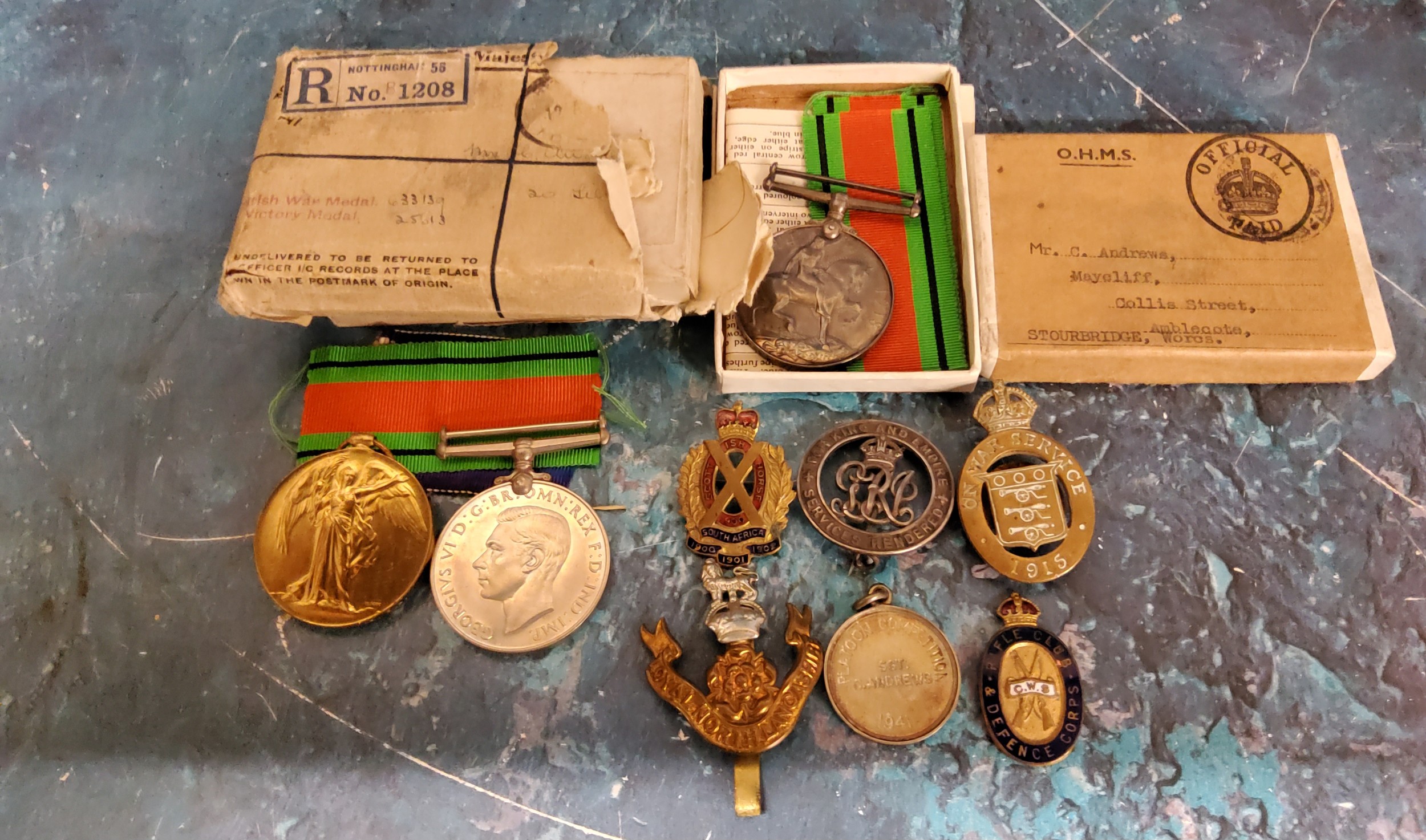 Militaria - a WWI British War and Victory awarded to 204964 GNR. C. ANDREWS. R.A. in original postal