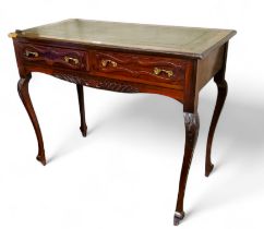 An early 20th century mahogany desk, 73cm high, 91cm wide, c.1920
