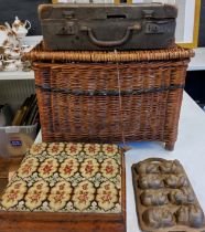 A Victorian walnut foot stool, tapestry top, 31cm wide, c.1870;  a fishing basket;  a suitcase;  etc