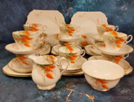 A Shelley Wisteria pattern tea service, for twelve, comprising eleven cups, twelve saucers and