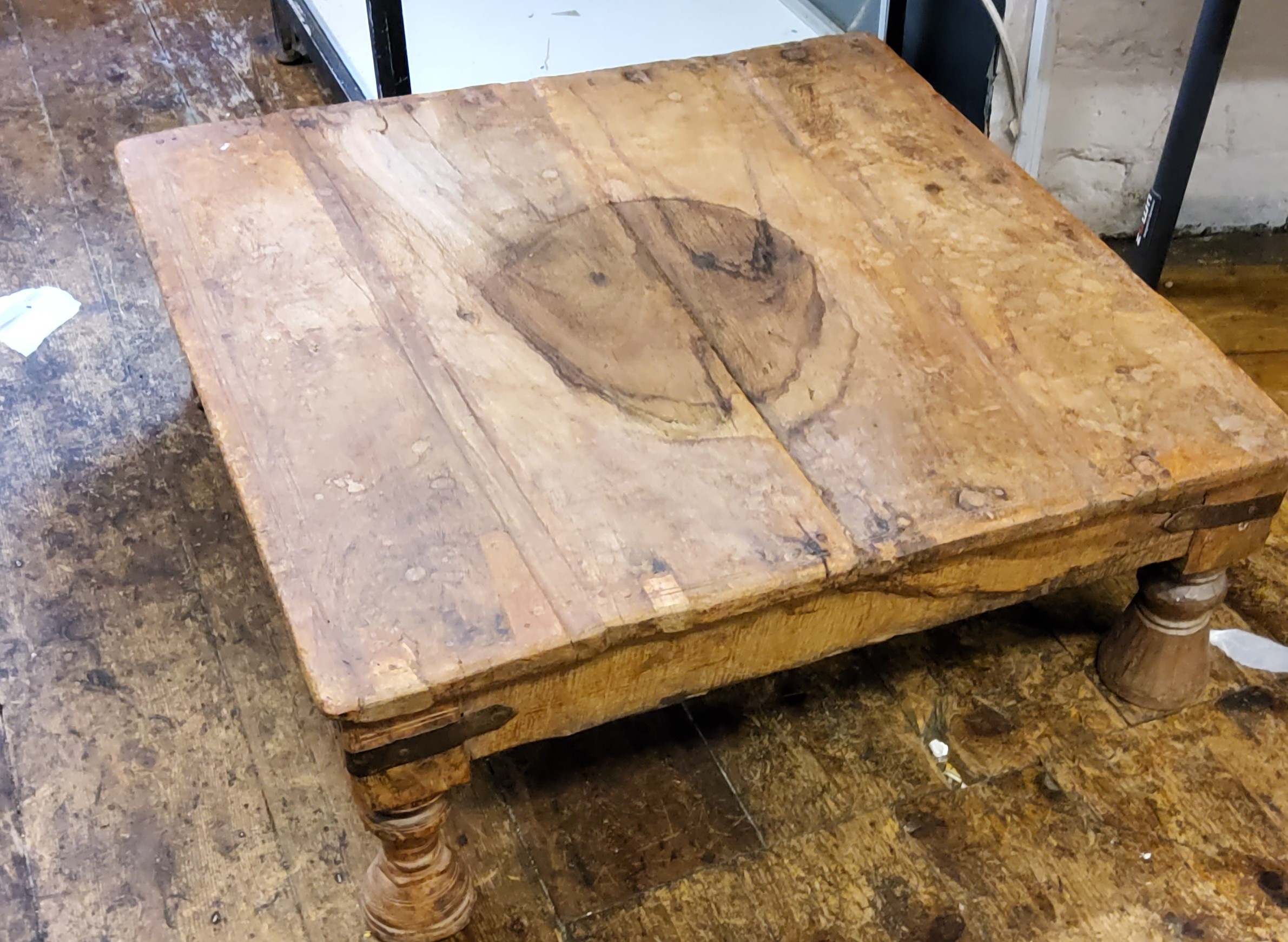 A Thacket low square coffee table, 23cm high, 63cm wide