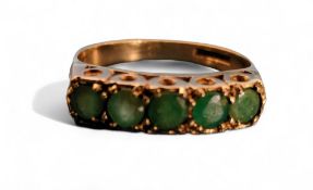 A 9ct gold & emerald ring, set with five round emeralds, approx. 0.75cts total, size O, 2.46g gross