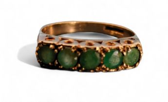 A 9ct gold & emerald ring, set with five round emeralds, approx. 0.75cts total, size O, 2.46g gross