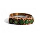 A 9ct gold & emerald ring, set with five round emeralds, approx. 0.75cts total, size O, 2.46g gross