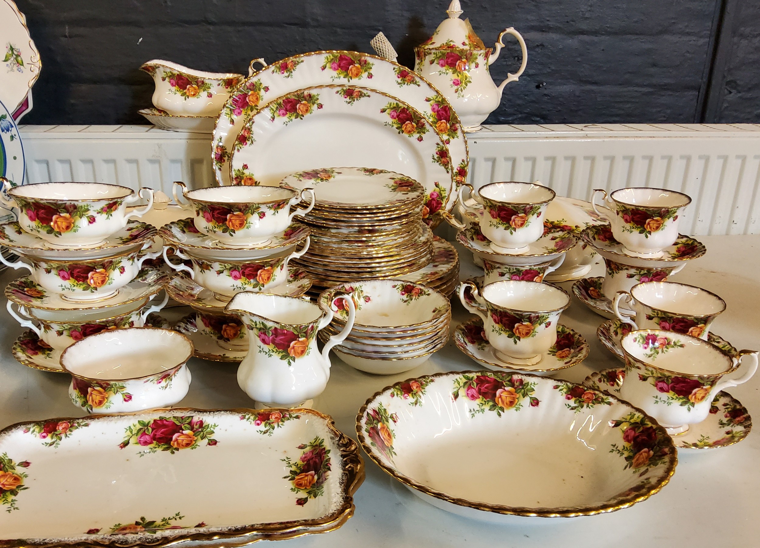 A Royal Albert Old Country Roses dinner and tea service, for six, comprising teapot, cream jug and