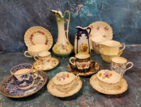 A Booths coffee can and saucer, painted with a fanciful bird on a scale blue ground, c.1900;