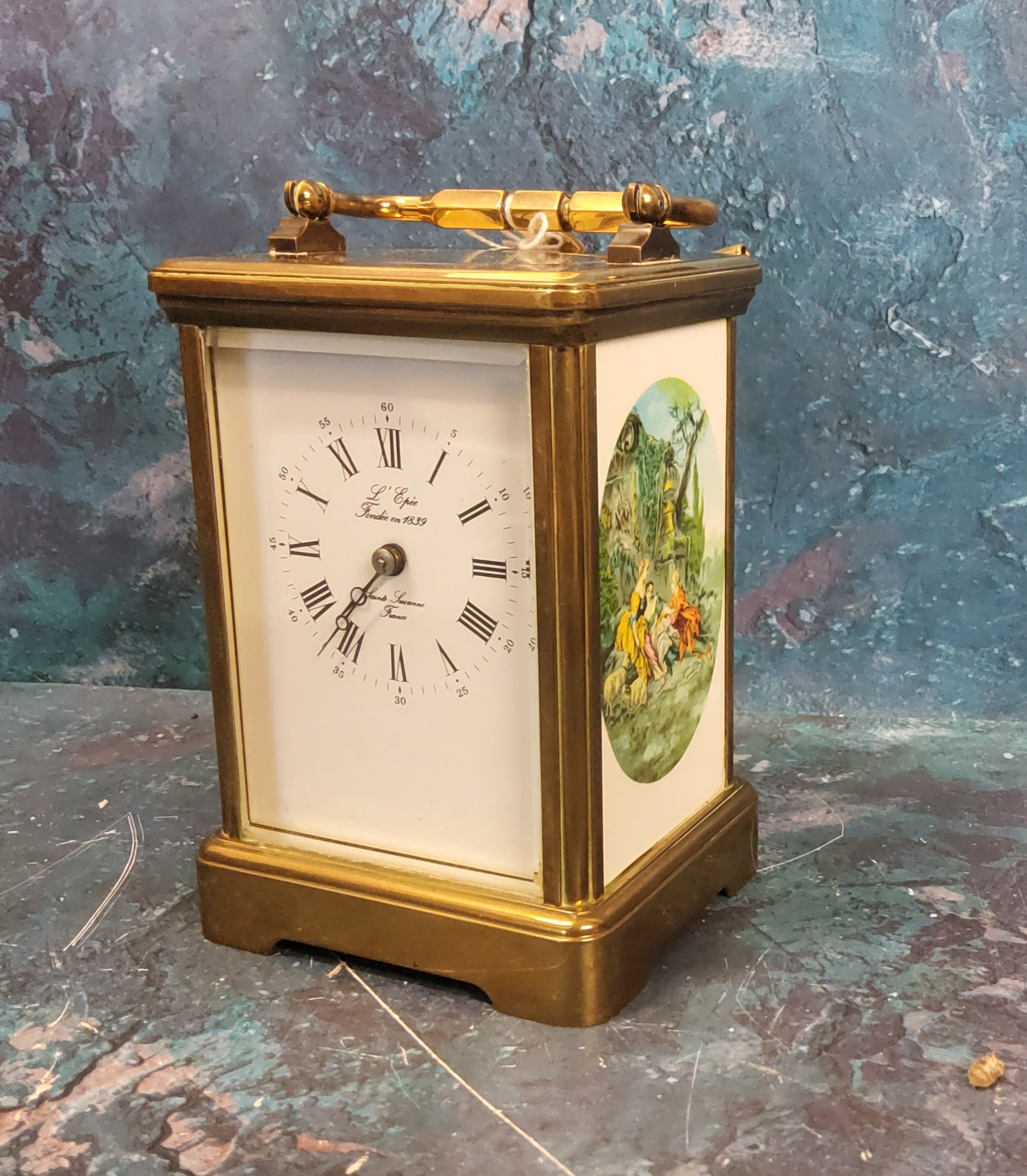 A French brass carriage clock, the sides printed with scene after Fragonard, 13cm high, 20th century