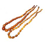 A butterscotch Amber graduated oval bead necklace, the largest measuring 14.9mm x 13.1mm each 20.