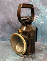 A late 19th century railway shunting lamp, three aspect burner,  30cms high