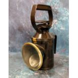 A late 19th century railway shunting lamp, three aspect burner,  30cms high