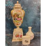 A German pedestal ovoid vase and cover, printed with Cupid and a lady, with summer flowers, gilt