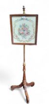 A Victorian style telescopic tapestry pole screen, approx 145cm high