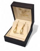 A pair of 9ct gold faux pearl drop earrings