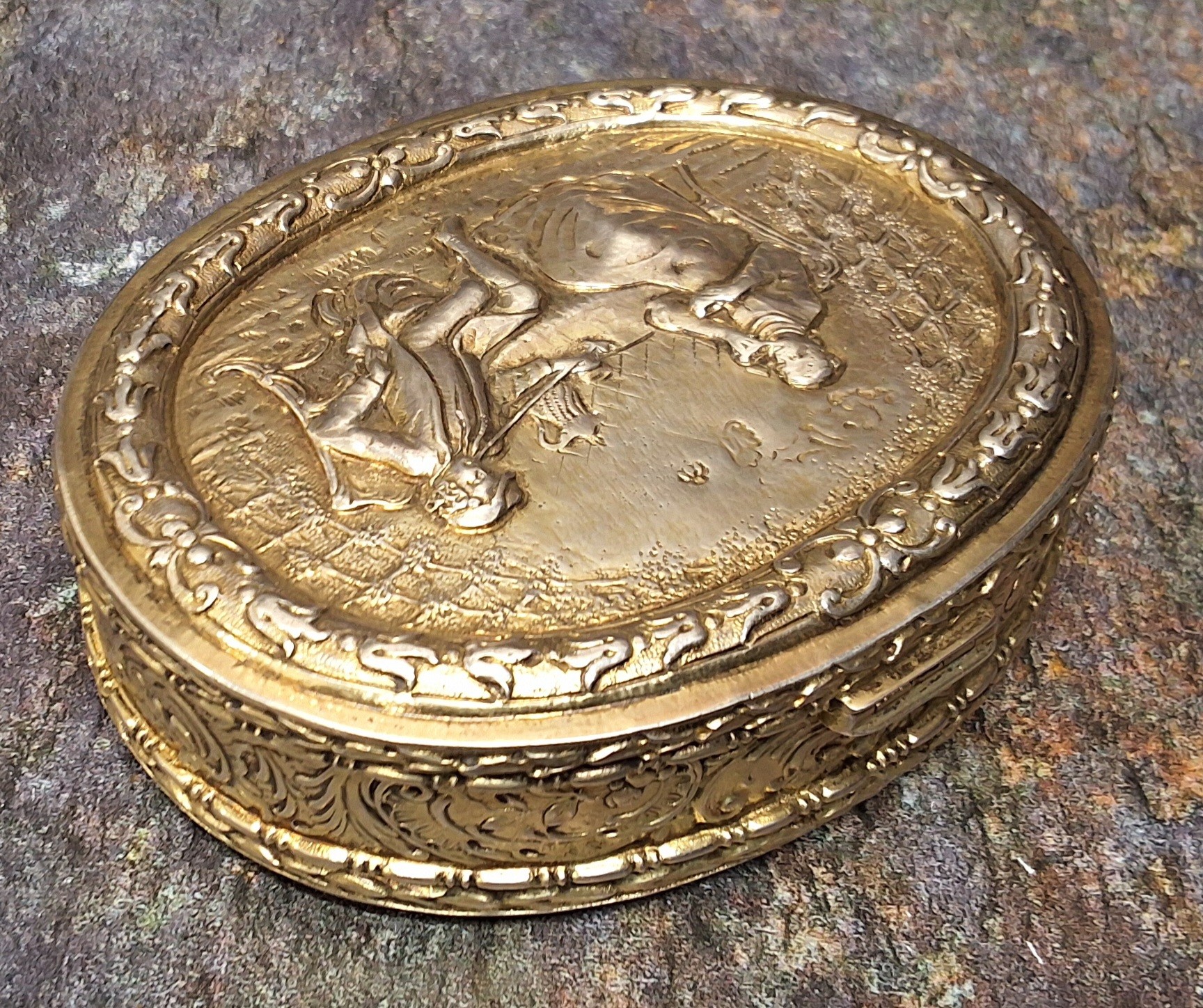 A good Dutch silver oval table snuff box, the cover embossed with figures at a table, harebell - Image 3 of 4