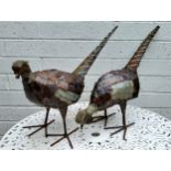 A near pair of pheasants constructed from steel and oxidised metal