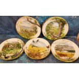 Twelve Royal Worcester 'Nature Scenes' Franklin porcelain  plates, designed by Peter Banett, printed