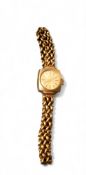 A 9ct gold lady's Accurist watch, Swiss 21 Jewel movement signed Accurist, silver dial, gold baton