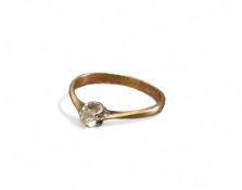A 14ct gold diamond solitaire ring, the round diamond approx. 12pts, size N, 1.88g