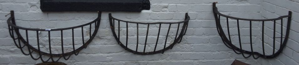 A 19th century cast iron hay rack, 80cm wide;  another, 75cm wide;  another, corner (3)