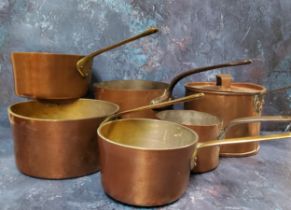 A 19th century copper saucepan and cover, steel handle, 18cm diam, c.1870; others, 18.5cm and