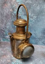 An early 20th century carriage lamp, steel loop handle, 38cm high