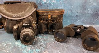 A Sony Alpha 390 digital SLR camera;  a pair of Skybolt 8 x 30 binoculars,  in a leather case;  a