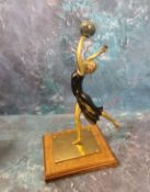 Art Deco, a gilt metal figure, lady dancing with a ball, 30cm high