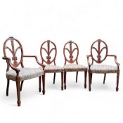A set of four Sheraton Revival mahogany dining chairs Prince of Wales feathers splat, stuffed over