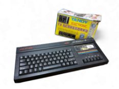 Sinclair 128k ZX Spectrum+2, (crack to cassette plastic);  Tandy Electronic TV Scoreboard , in