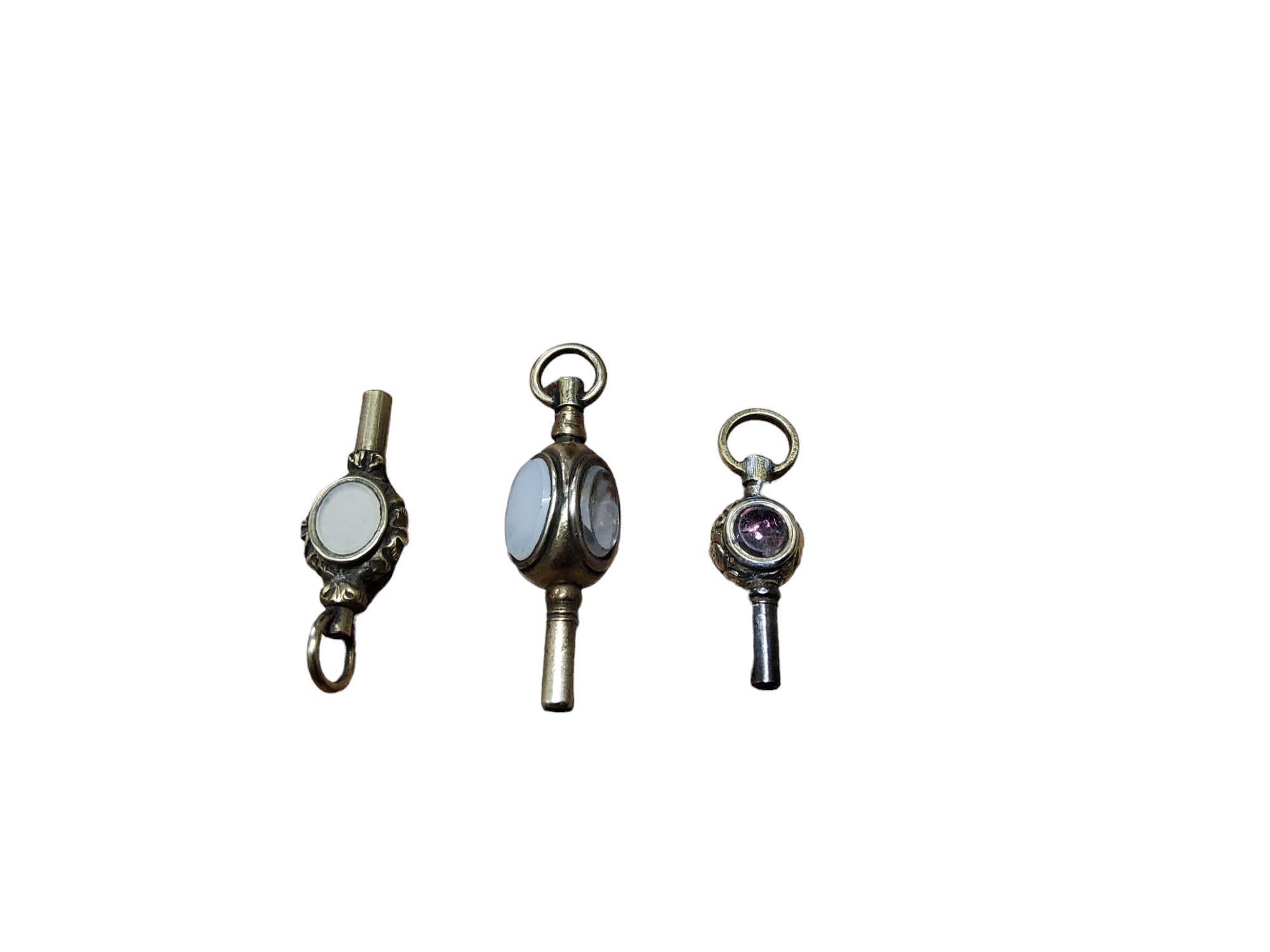 A Victorian pocket watch key, set with semi-precious stones;  others (3)