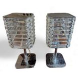 Lighting - a pair of ribbed perspex and chrome side lights, 35cm high