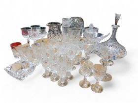 Glassware - a cut glass ship's decanter;  champagne coupes, tumblers, wine and sherry glasses;  etc
