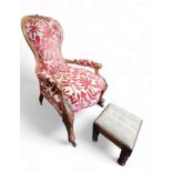 A Victorian walnut spoon back nursing chair, foliate carved scroll, c.1870; a Victorian square