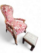 A Victorian walnut spoon back nursing chair, foliate carved scroll, c.1870; a Victorian square