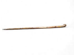 An early 19th century  sword stick, silver plaque inscribed T Doughty, blade length 69cm, overall