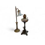 A 19th century style brass side light, frosted glass shade, 60cm high;  a figural oil lamp (2)