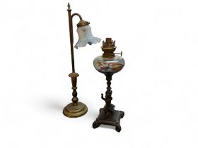 A 19th century style brass side light, frosted glass shade, 60cm high;  a figural oil lamp (2)