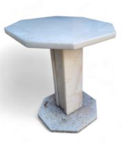 A "marble" octagonal garden table, square support, octagonal base, 45cm high