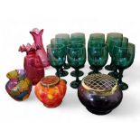 A set of twelve emerald glass wine glasses, bucket shaped bowls, 18cm high;  a cranberry glass vase;