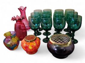 A set of twelve emerald glass wine glasses, bucket shaped bowls, 18cm high;  a cranberry glass vase;