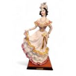 A Capo-di-Monte figure, modelled  by Vittorio Sabadin, Gypsy Dancer, 49cm high, wooden plinth