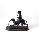 After Jules Moigniez, a dark patinated bronze, boy with a greyhound and hoop, oval base, 26cm high