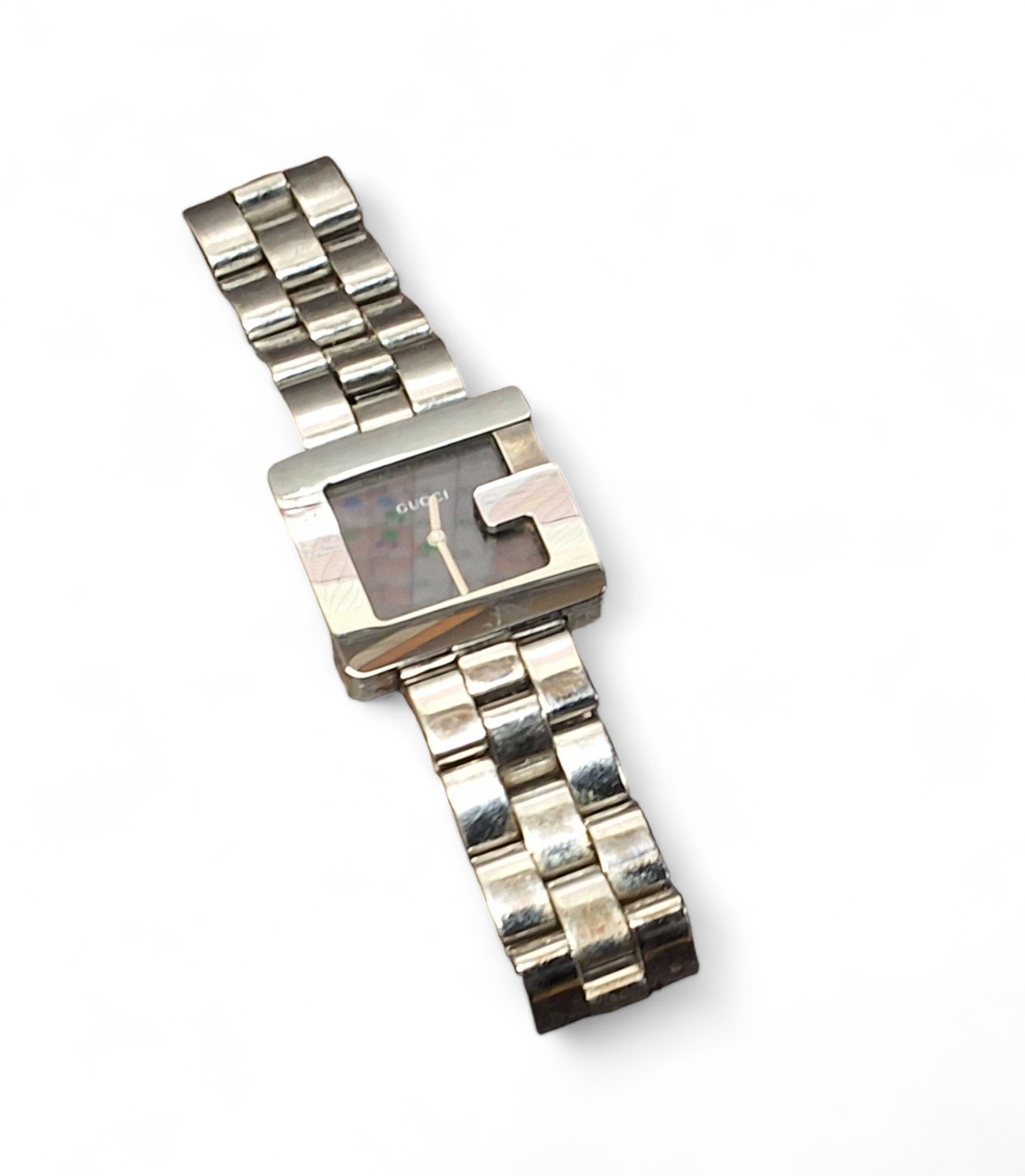 A Gucci lady's stainless steel wristwatch, model no. 3600J, quartz movment,  black dial, the bezel