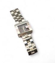 A Gucci lady's stainless steel wristwatch, model no. 3600J, quartz movment,  black dial, the bezel