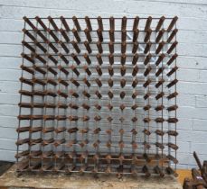 A substantial aluminium and wood wine rack, 117cm wide, 117cm high